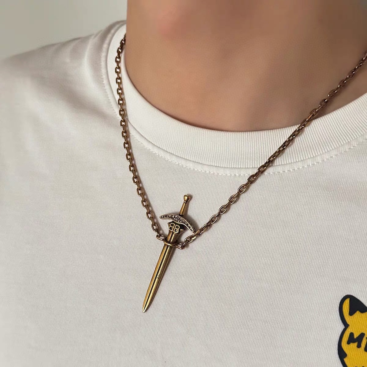 Martin Graham pendant necklace in polished metal-tone – front product view