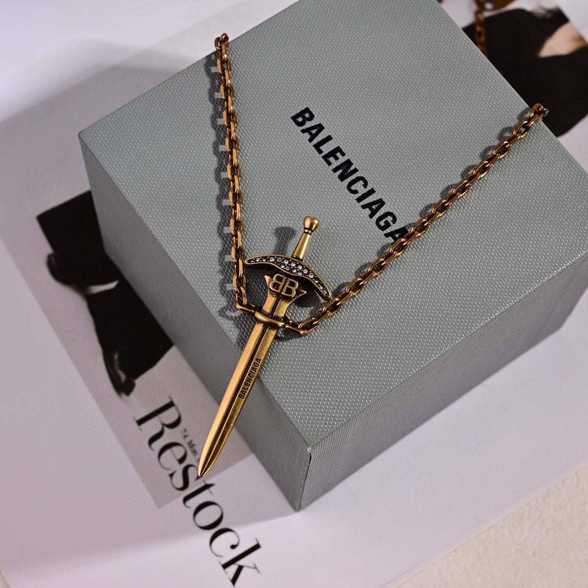Martin Graham pendant necklace in polished metal-tone – detail view