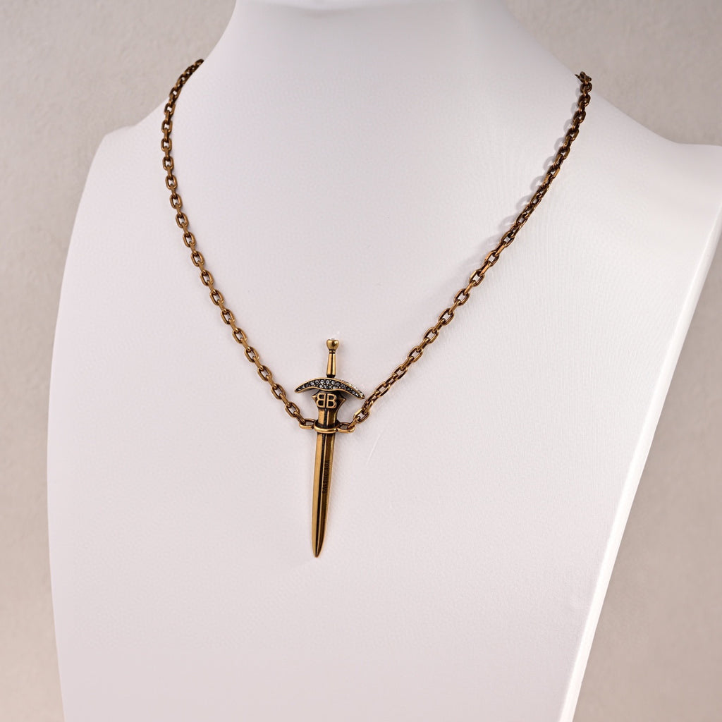 Martin Graham pendant necklace in polished metal-tone – styled product view