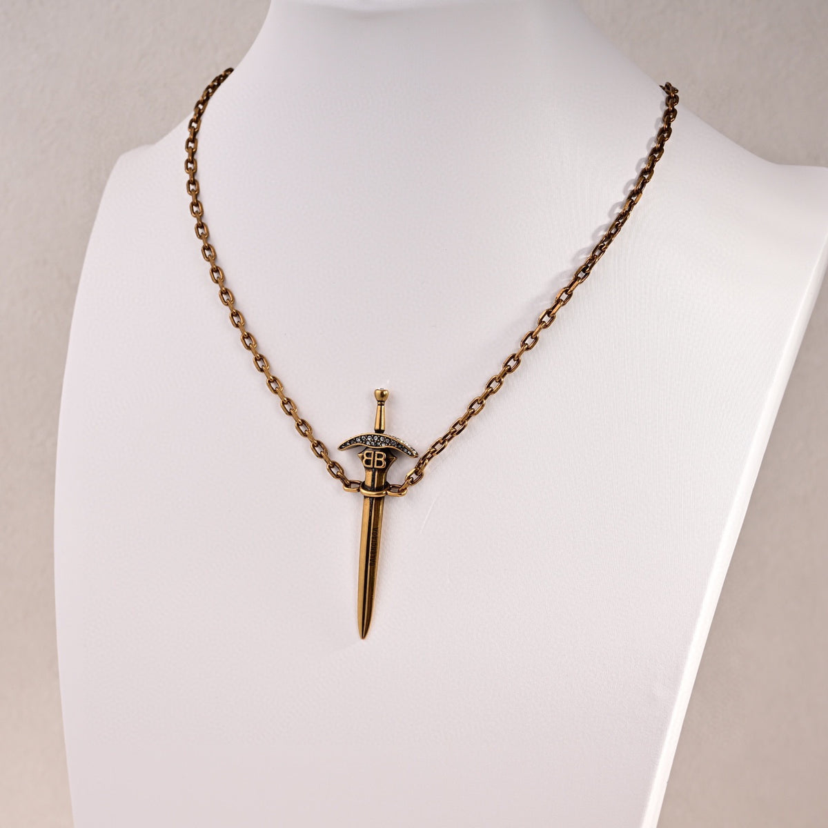 Martin Graham pendant necklace in polished metal-tone – styled product view