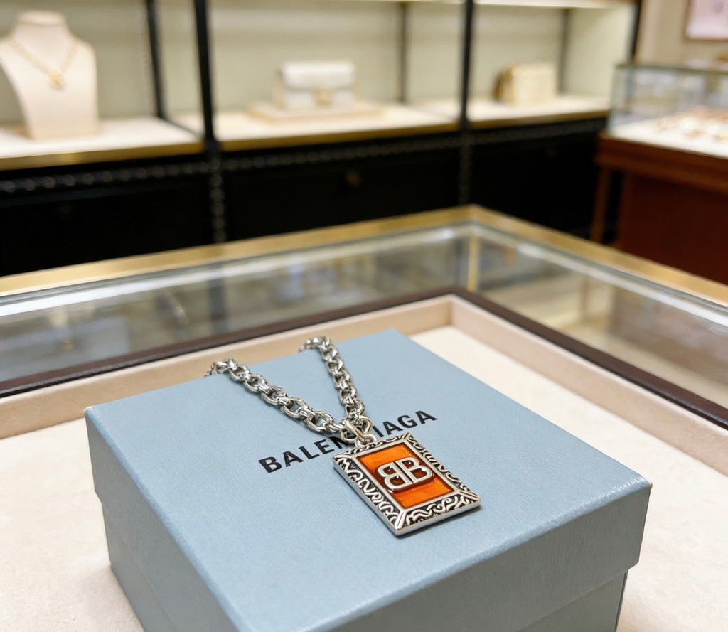 Martin Graham pendant necklace in polished metal-tone – front product view