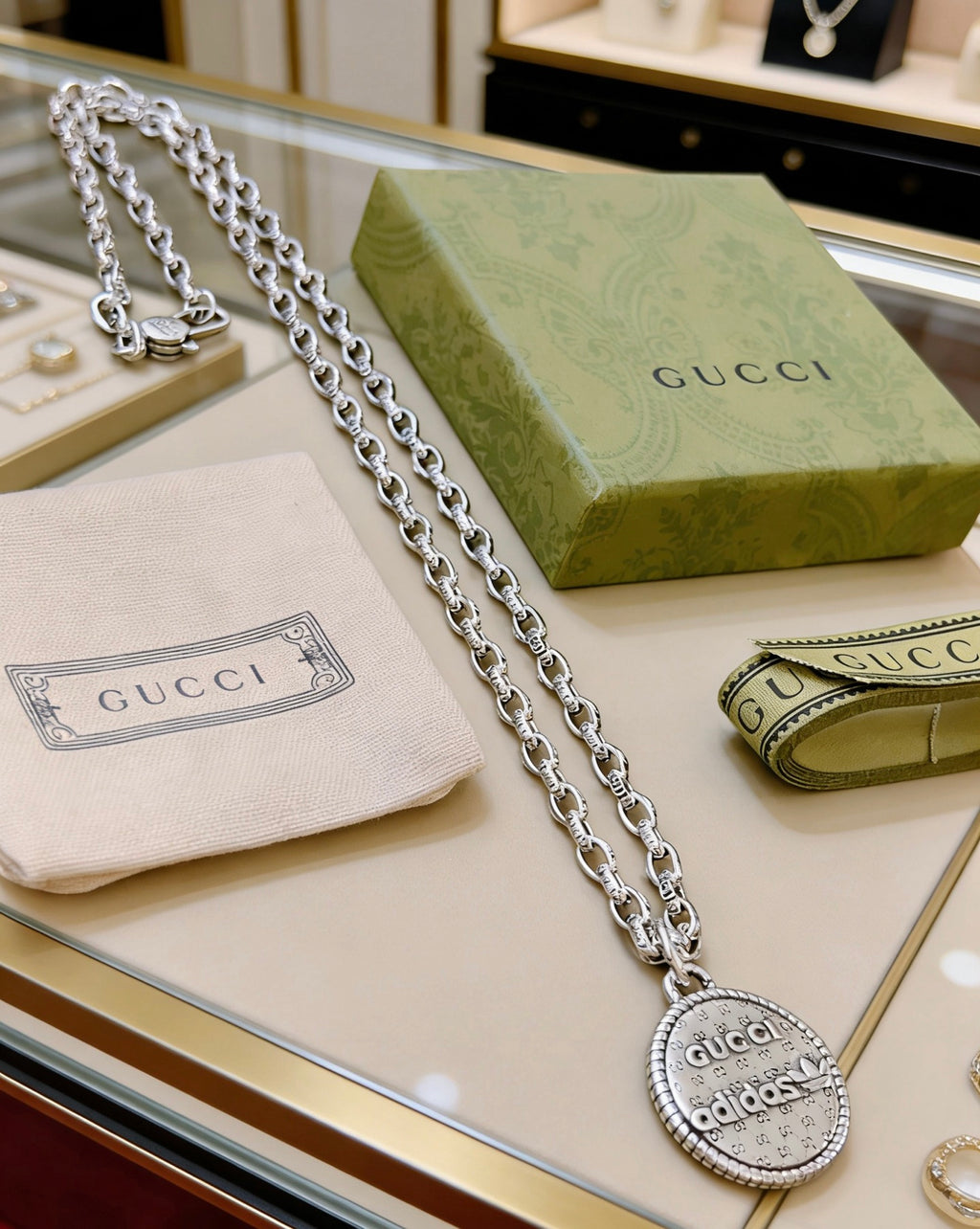 Double-G Emblem Pendant Necklace in Polished Metal-Tone – Vintage Detail – Design 027 detail view