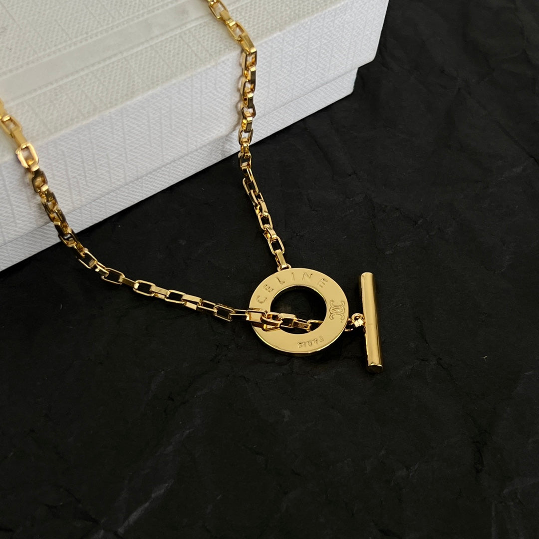 Signature Emblem Pendant Necklace in Polished Metal-Tone – Design 02 close-up view