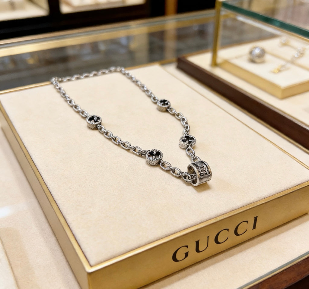 Double-G Emblem Pendant Necklace in Polished Metal-Tone – Design 105 close-up detail
