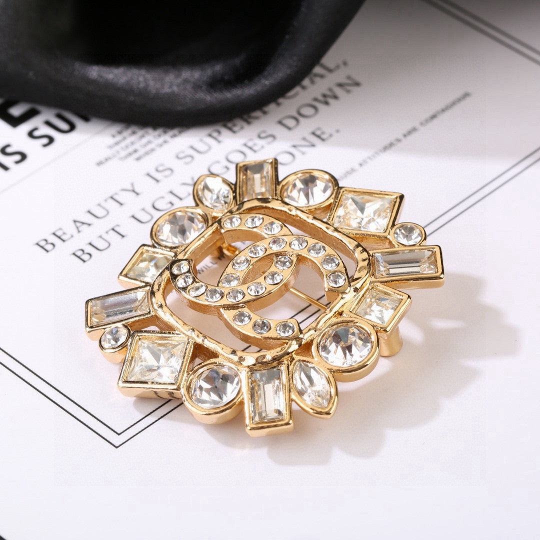 Double-C Emblem Brooch in Polished Metal-Tone – Design 016 front product view