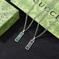 Double-G Emblem Pendant Necklace in Polished Metal-Tone – Design 040 main product view
