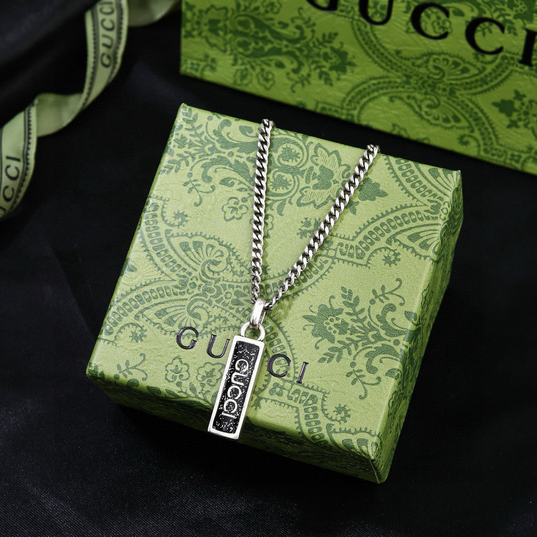 Double-G Emblem Pendant Necklace in Polished Metal-Tone – Design 040 detail view