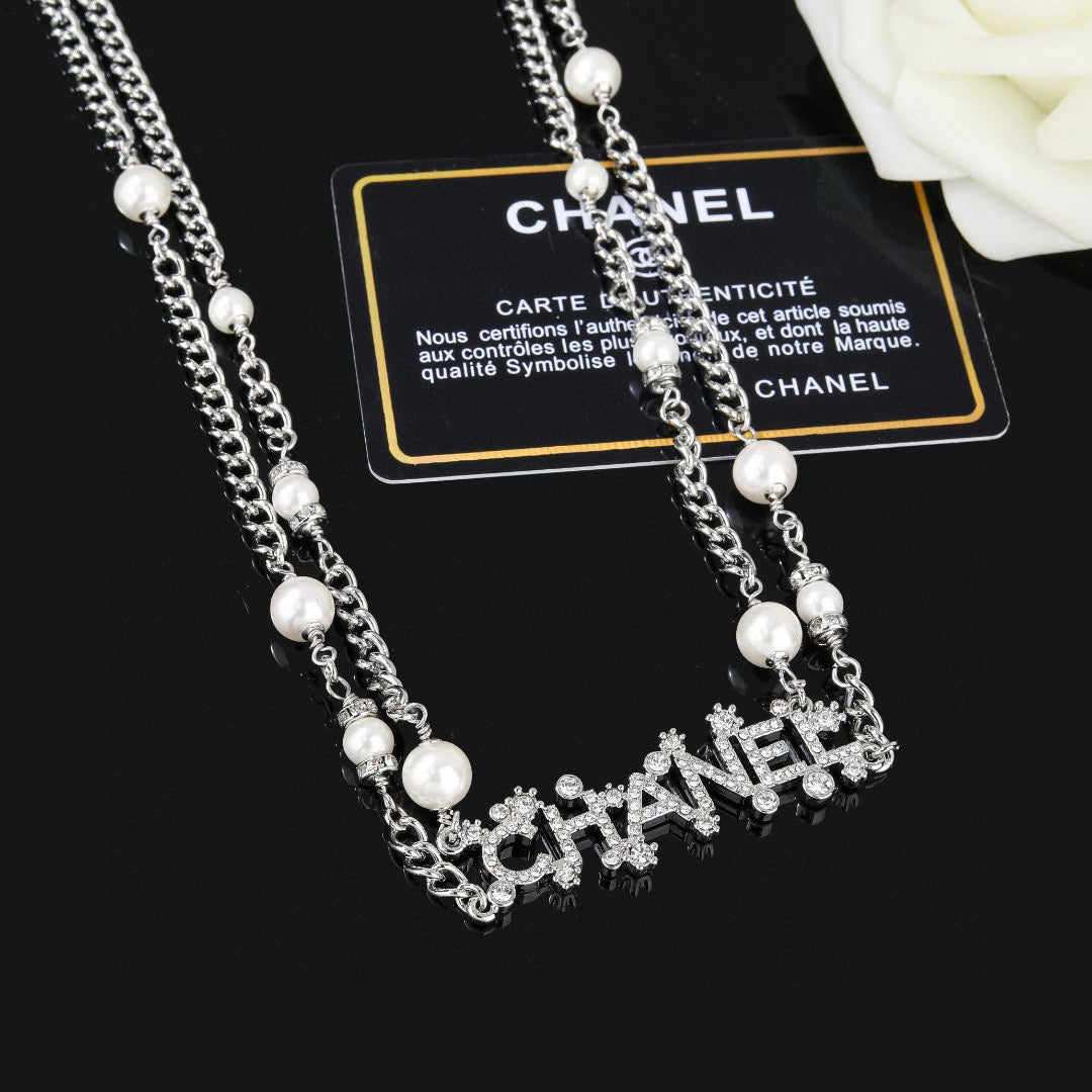 Signature Emblem Jewelry Accessory in Polished Metal-Tone – Design 011 close-up detail