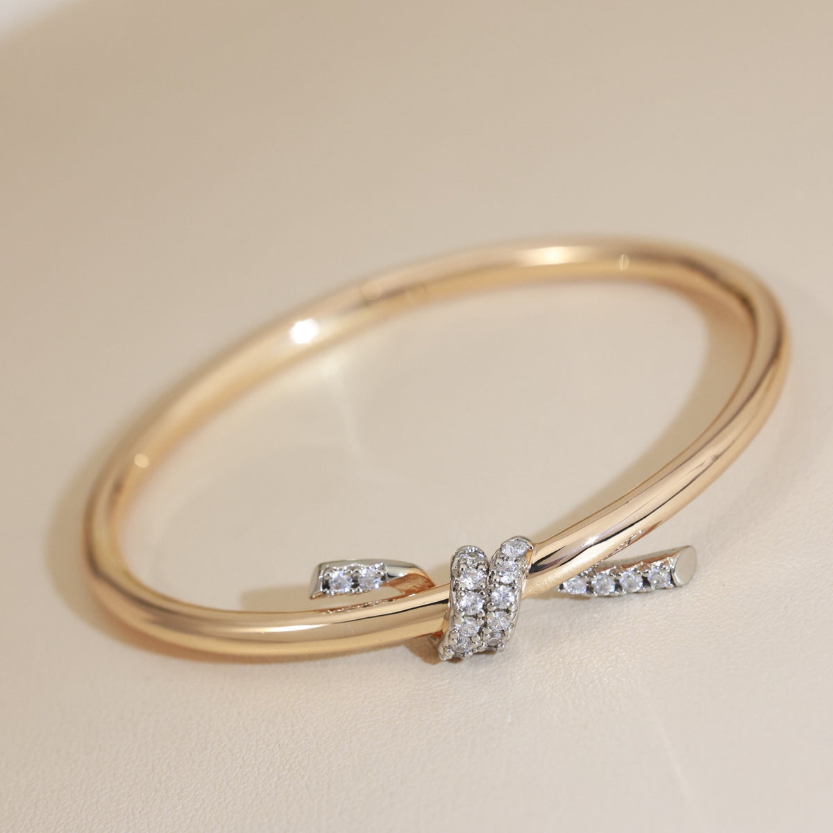 Knot Bangle in Gold-Tone close-up detail