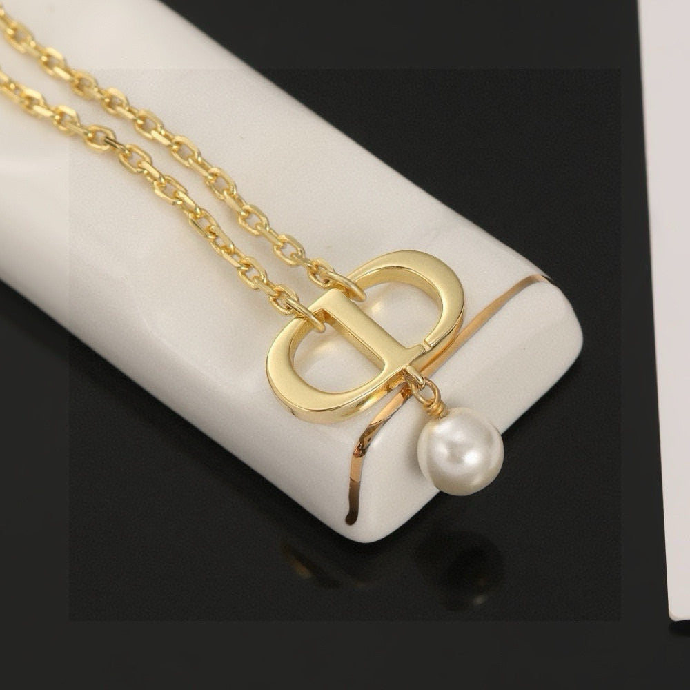Pearl-Style Motif Pendant Necklace in Polished Metal-Tone with Pearl-Style Detail – Design 006 close-up detail
