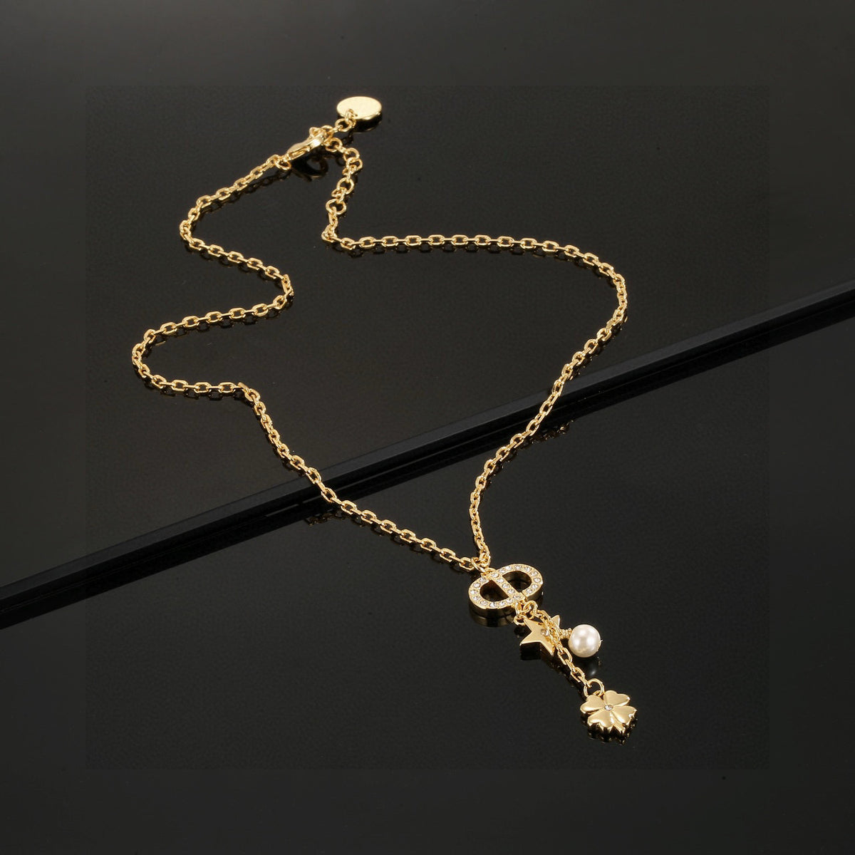 Graphic Letter Motif Pendant Necklace in Polished Metal-Tone with Vintage-Style Finish – Design 002 main product view