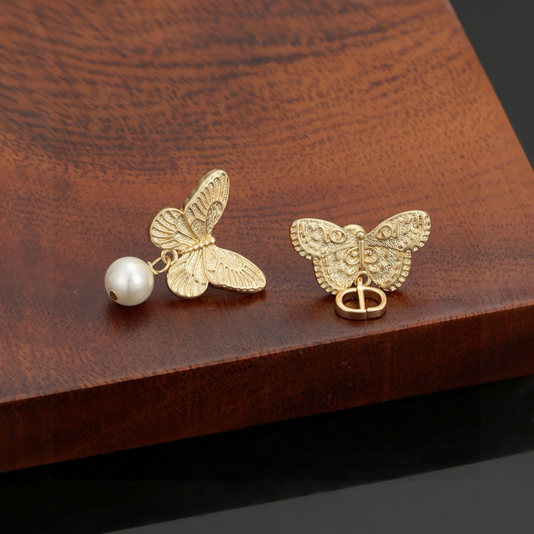 Bow & Butterfly Motif Stud Earrings in Silver-Tone with Asymmetric Detail – Design 003 detail view
