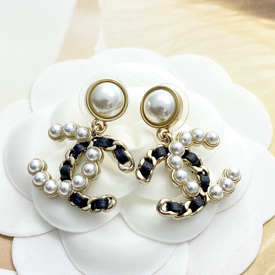 Double-C Emblem Pearl-Detail Stud Earrings – Pearl Detail – Design 004 close-up detail