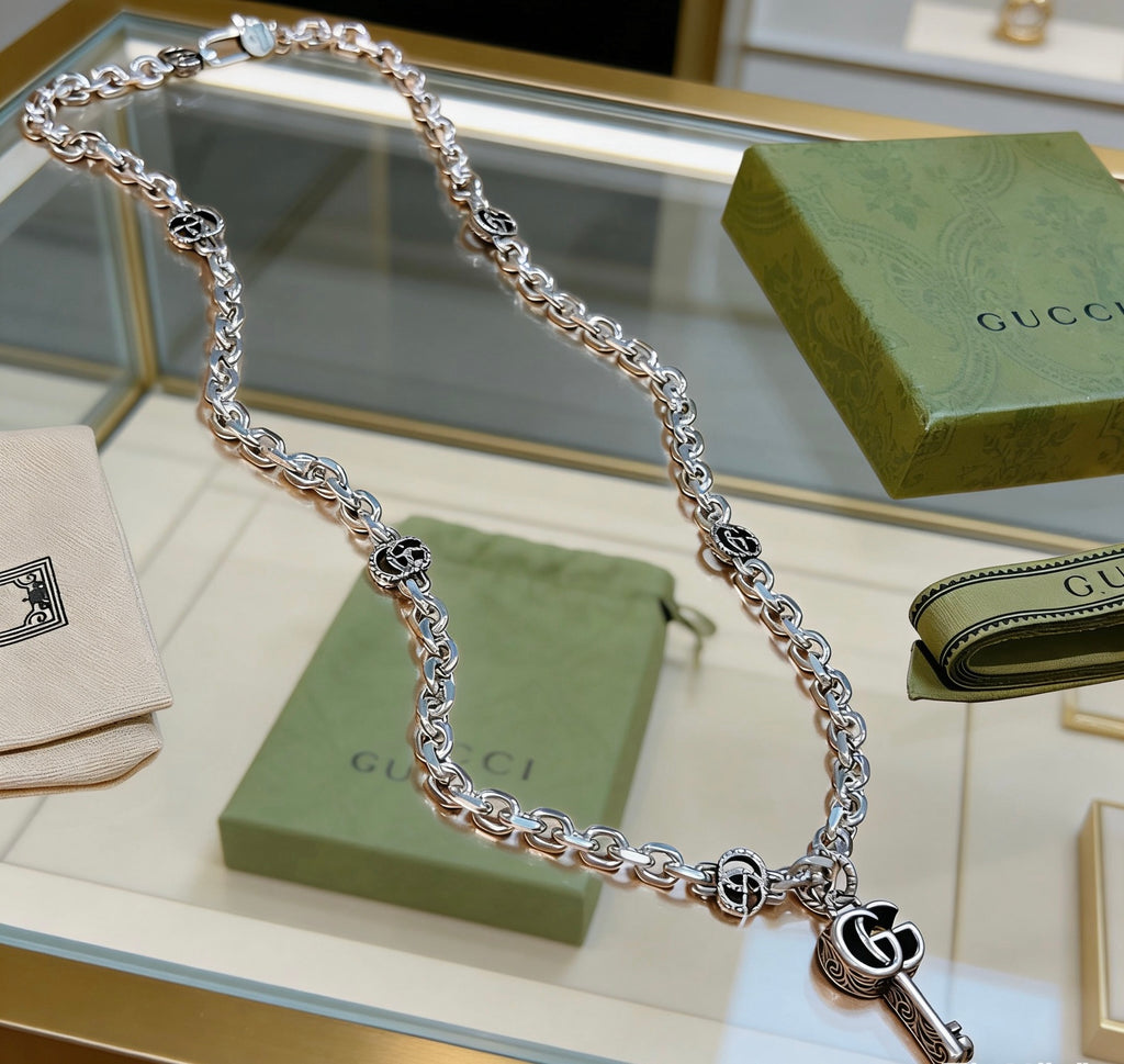 Double-G Emblem Pendant Necklace in Polished Metal-Tone – Design 076 close-up detail