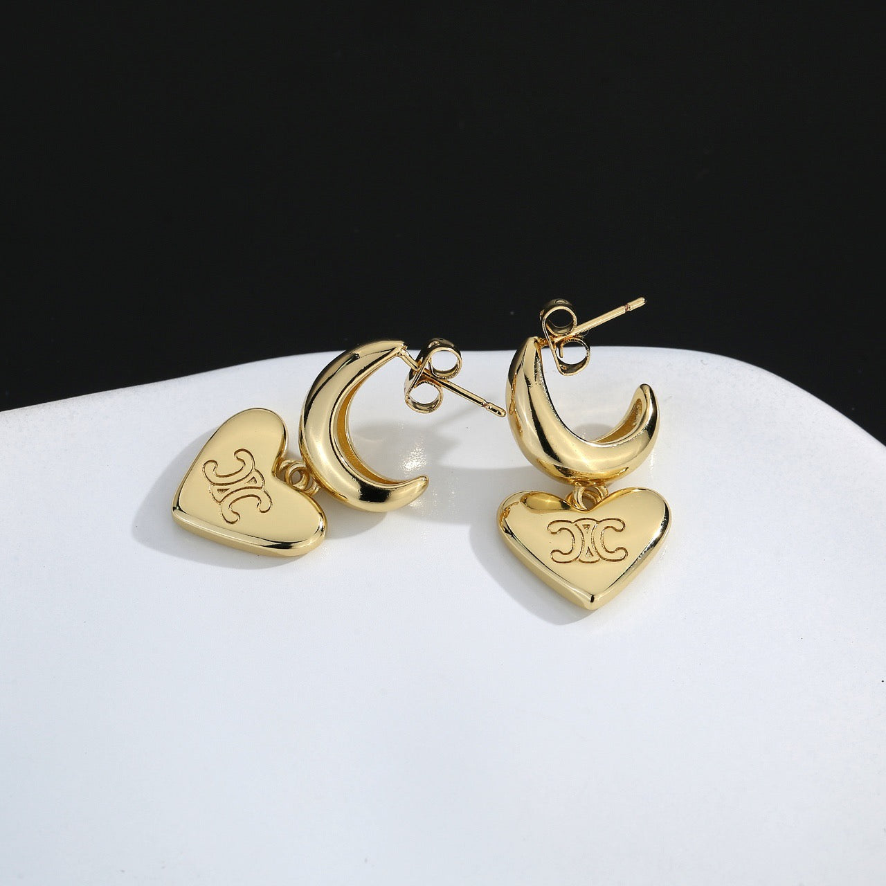 Signature Emblem Stud Earrings in Gold-Tone – Design 02 close-up view