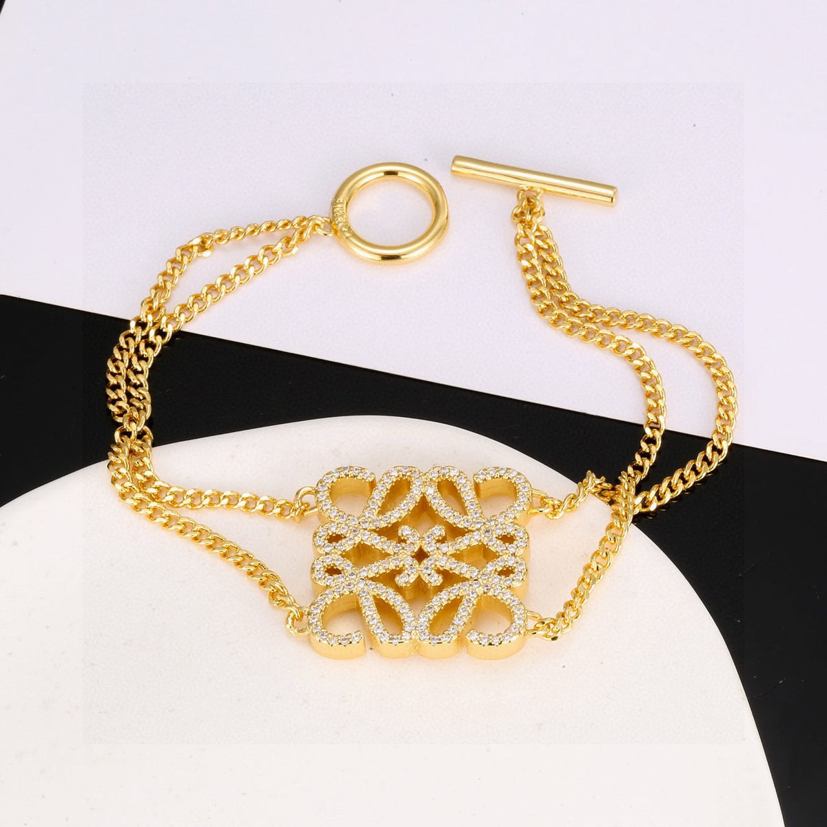 Floral Motif Statement Bracelet in Gold-Tone with Crystal-Style Accents detail view