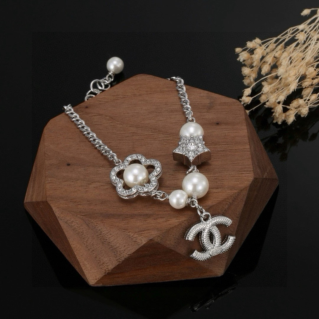 Camellia Bracelet in Polished Metal-Tone – Pearl Detail front product view