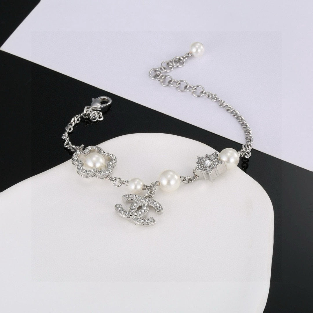Camellia Bracelet in Polished Metal-Tone – Pearl Detail side detail