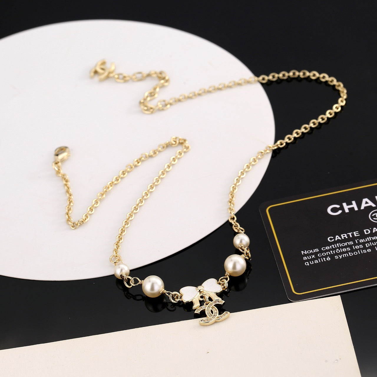 Bow Pendant Necklace in Polished Metal-Tone main product view