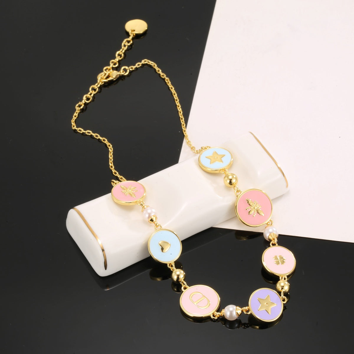 Graphic Letter Motif Pendant Necklace in Gold-Tone with Vintage-Style Finish – Design 001 front view
