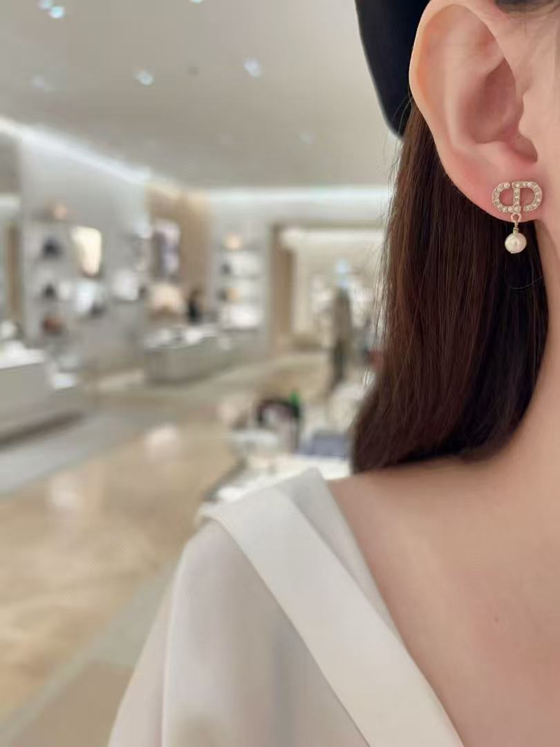 Graphic Letter Motif Stud Earrings in Polished Metal-Tone with Asymmetric Detail side detail