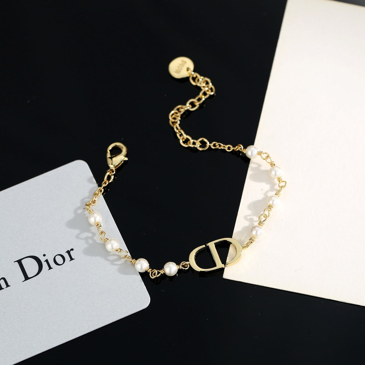 Pearl-Style Motif Statement Bracelet in Polished Metal-Tone with Pearl-Style Detail – Design 004 styled view