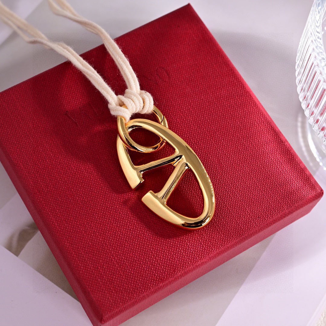 Signature Emblem Pendant Necklace in Polished Metal-Tone – Design 01 styled detail