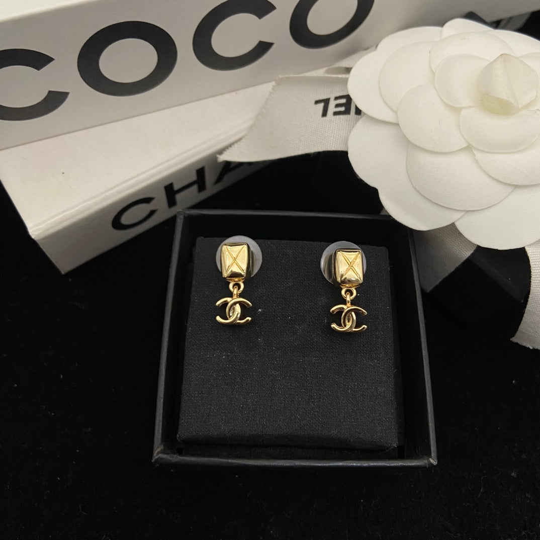 Double-C Emblem Stud Earrings in Polished Metal-Tone – Design 203 front product view