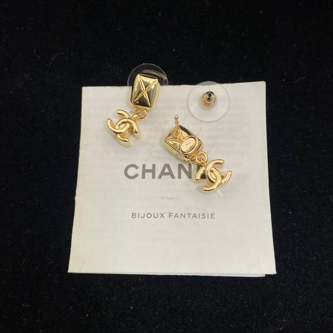Double-C Emblem Stud Earrings in Polished Metal-Tone – Design 203 styled product view