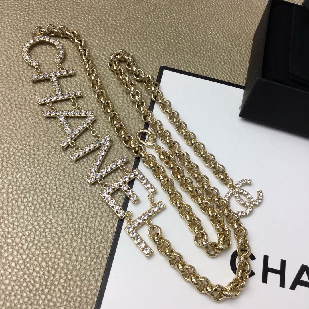 Signature Emblem Jewelry Accessory in Polished Metal-Tone – White Detail – Design 003 styled product view