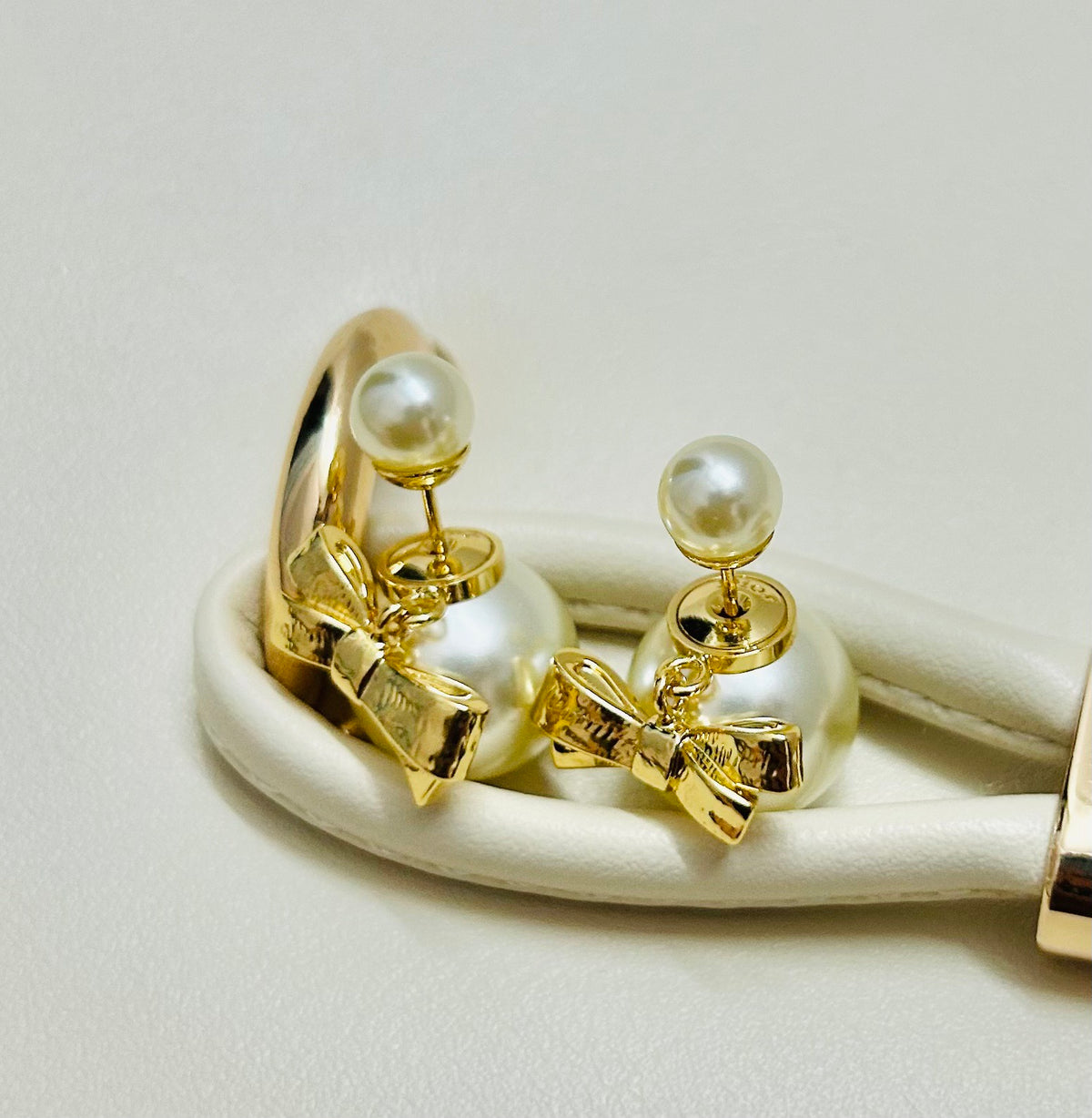 Bow & Butterfly Motif Stud Earrings in Polished Metal-Tone – Design 004 detail view