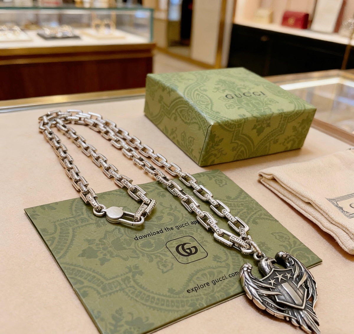 Double-G Emblem Pendant Necklace in Polished Metal-Tone – Vintage Detail – Design 031 close-up detail
