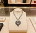 Double-G Emblem Pendant Necklace in Polished Metal-Tone – Vintage Detail – Design 031 main product view