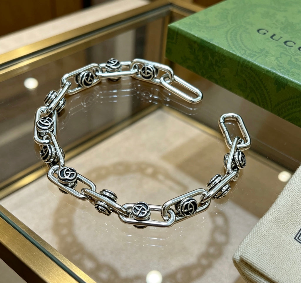 Geometric Emblem Bracelet in Polished Metal-Tone – Design 058 close-up detail