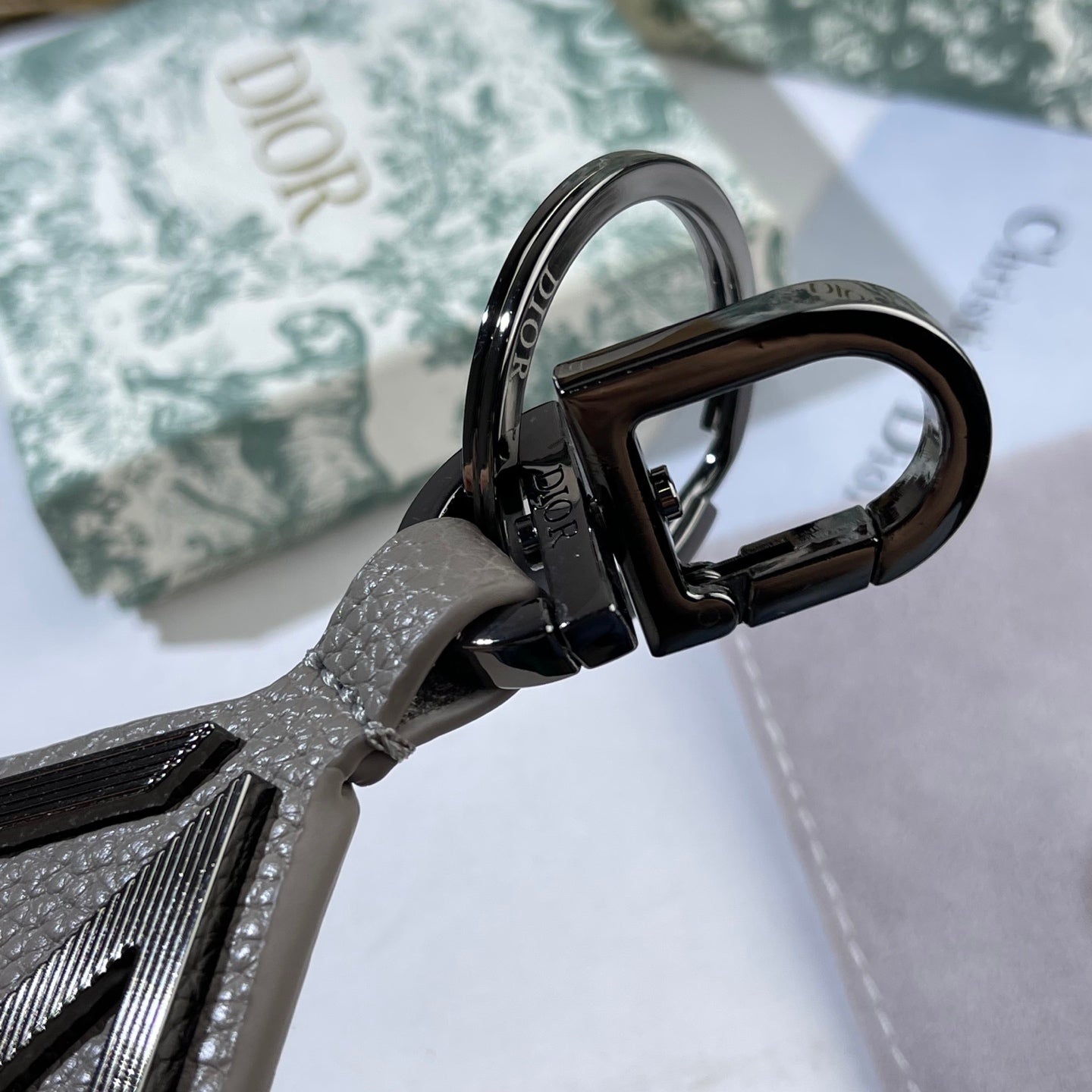 Graphic Letter Motif Bag Charm in Black-Tone styled view