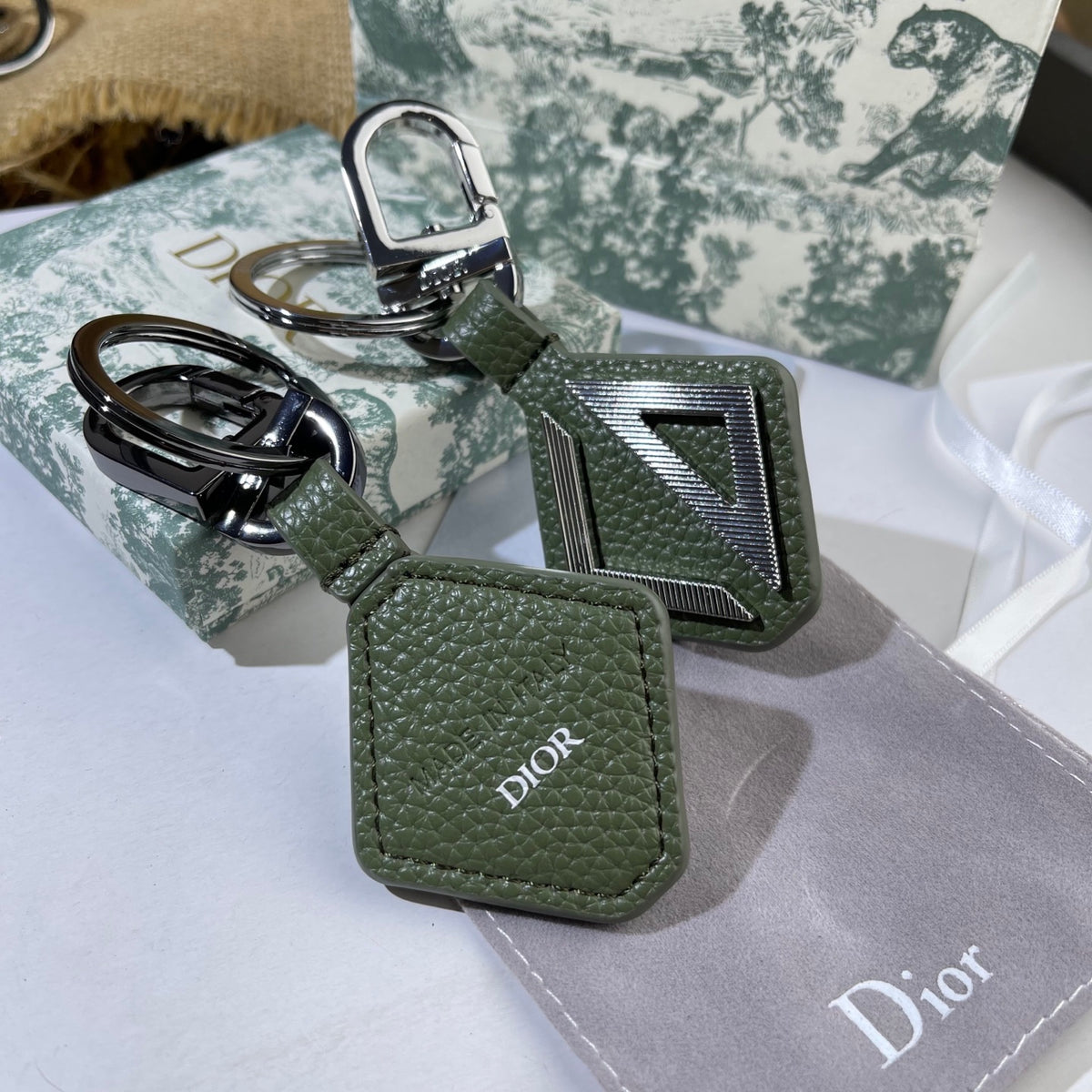 Graphic Letter Motif Bag Charm in Black-Tone close-up detail