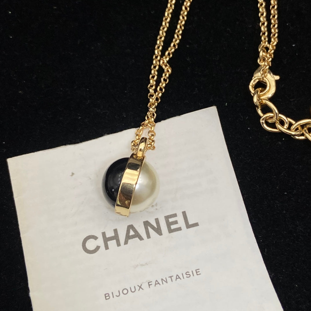 Double-C Emblem Pearl-Detail Pendant Necklace – Pearl Detail – Design 065 styled product view