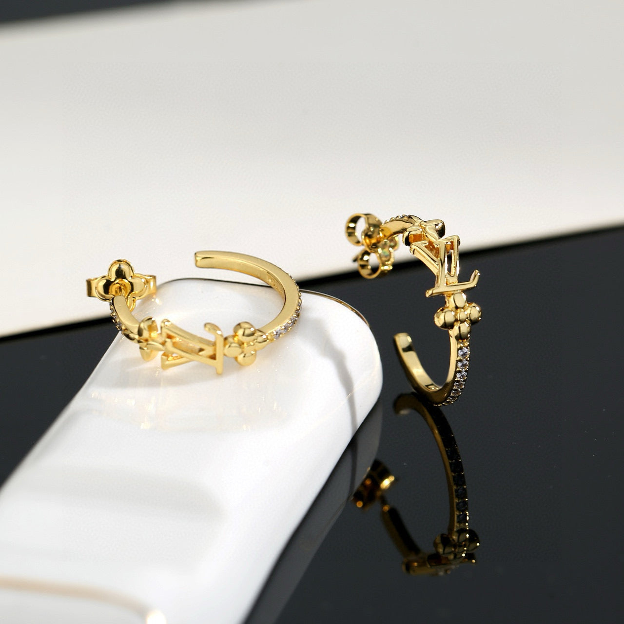 Letter Emblem Stud Earrings in Polished Metal-Tone – Design 017 front product view