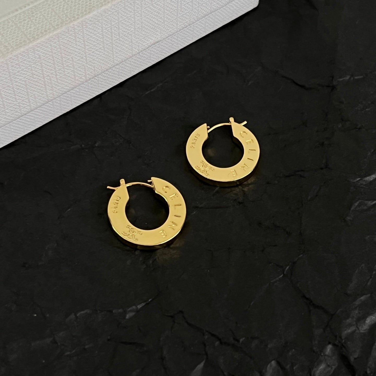 Signature Emblem Statement Earrings in Polished Metal-Tone – Design 01 close-up view