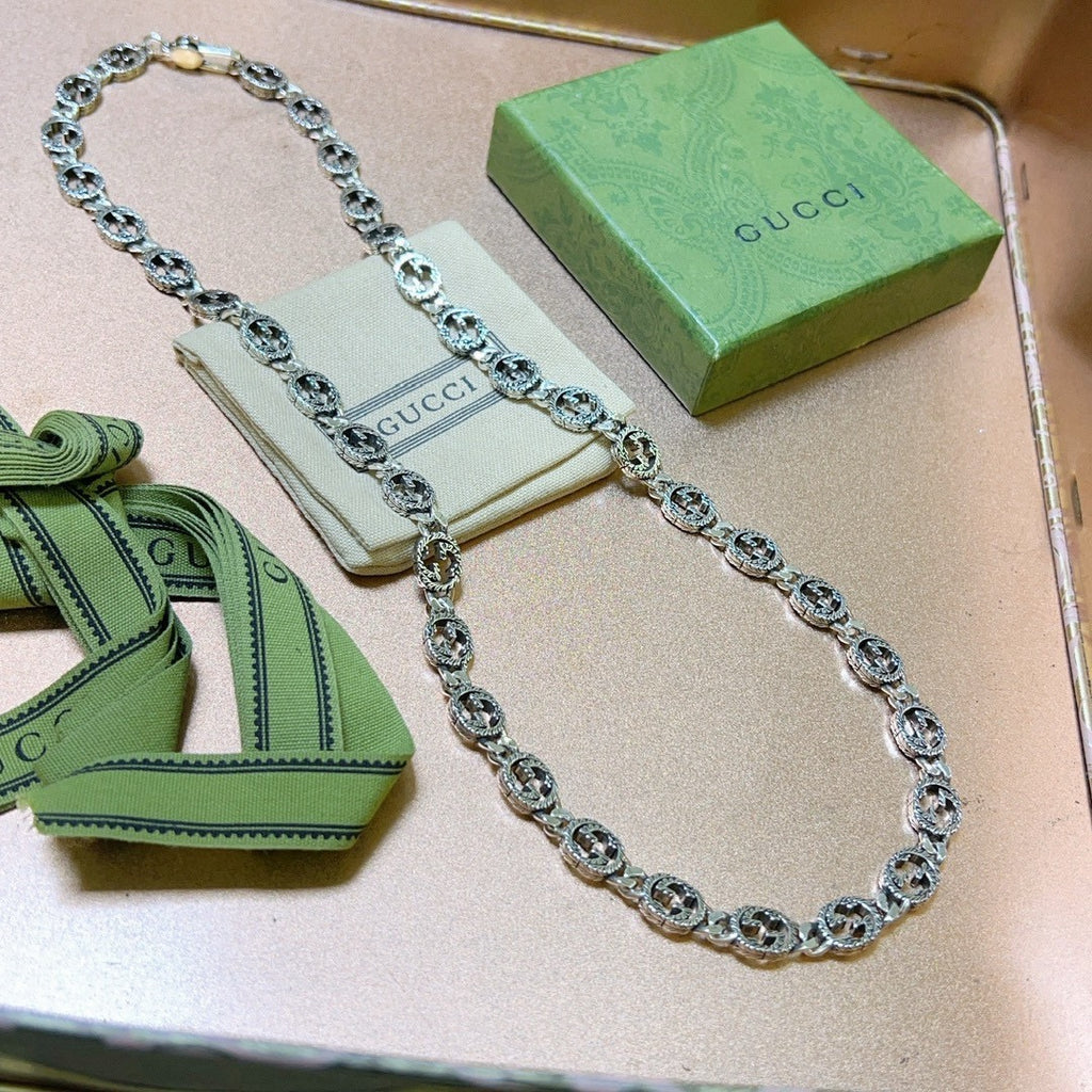 Martin Graham pendant necklace in polished metal-tone – styled product view