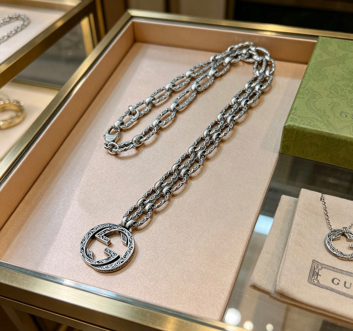 Martin Graham pendant necklace in polished metal-tone – front product view