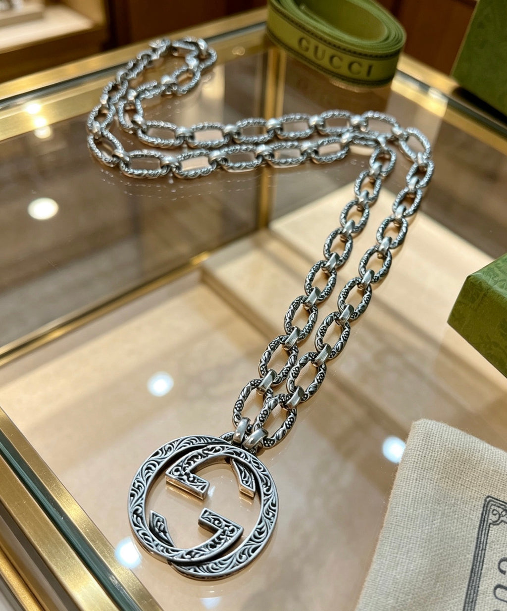 Martin Graham pendant necklace in polished metal-tone – styled product view