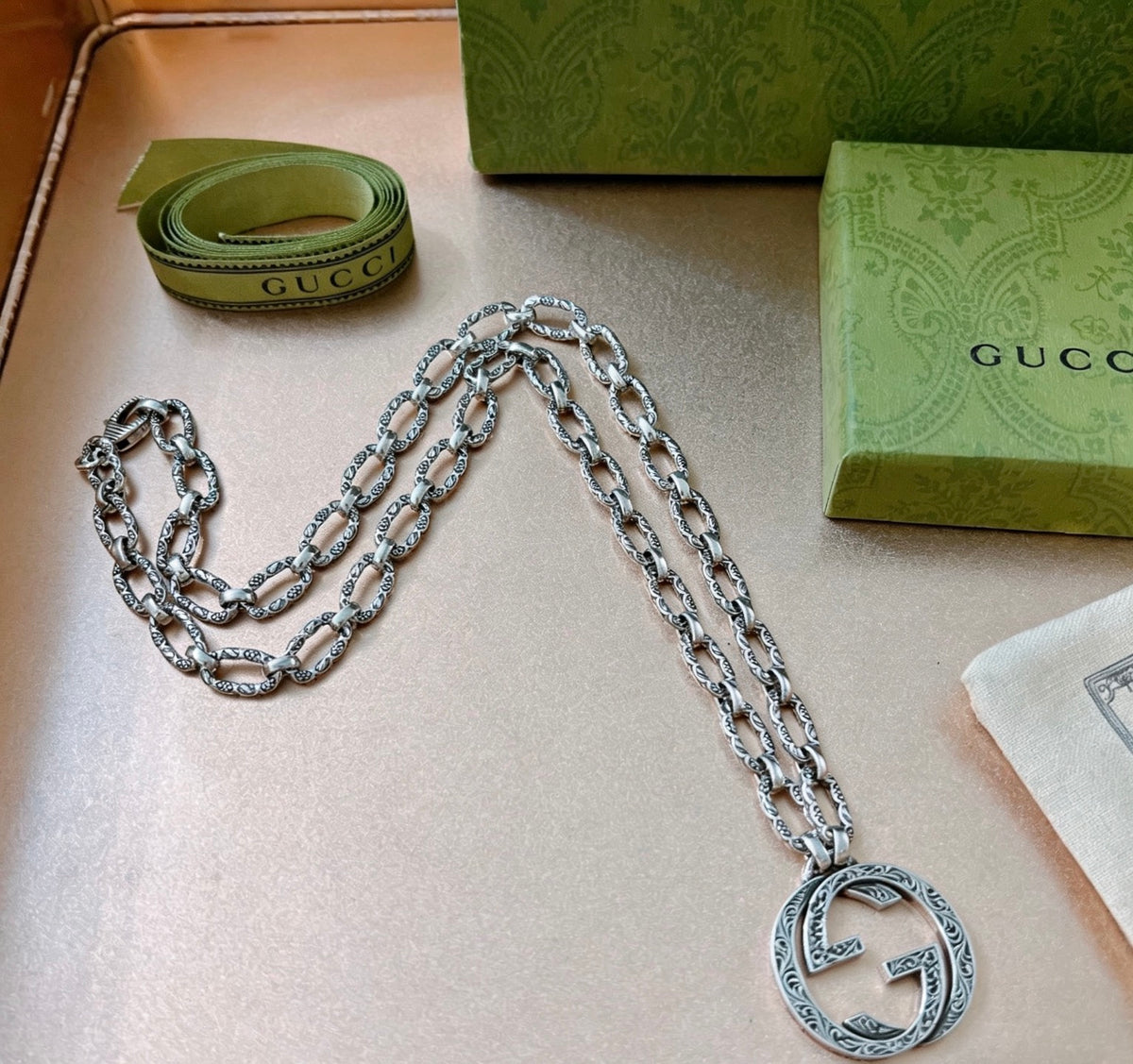 Martin Graham pendant necklace in polished metal-tone – front product view
