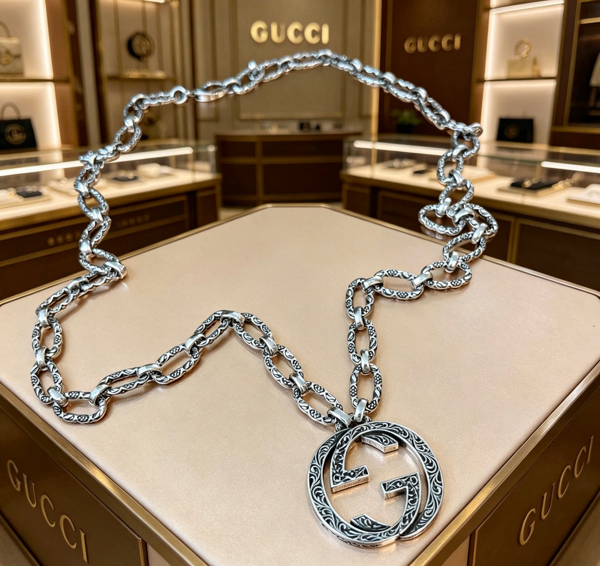 Martin Graham pendant necklace in polished metal-tone – detail view