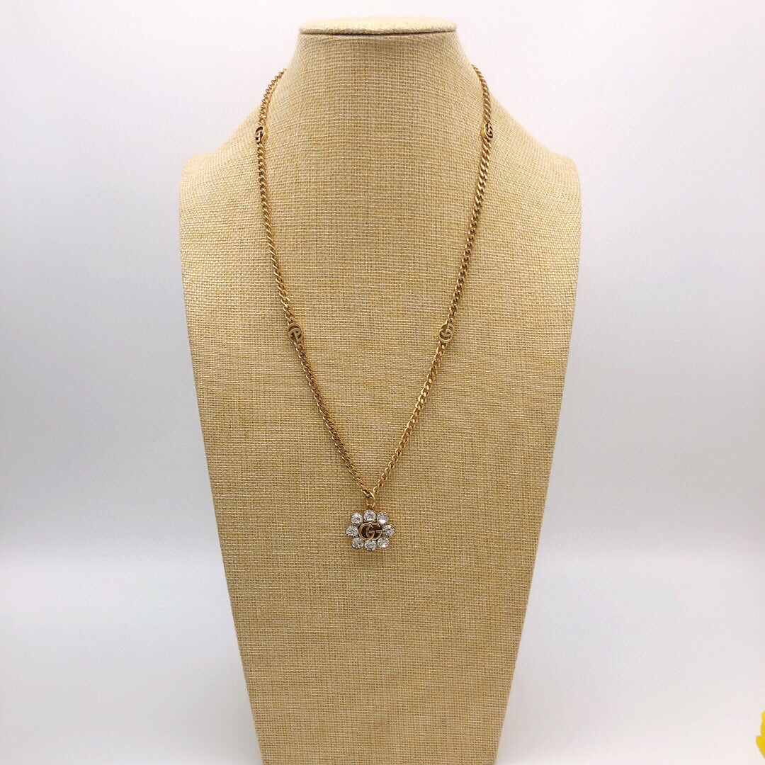 Geometric Emblem Pendant Necklace in Polished Metal-Tone – Crystal Detail styled product view