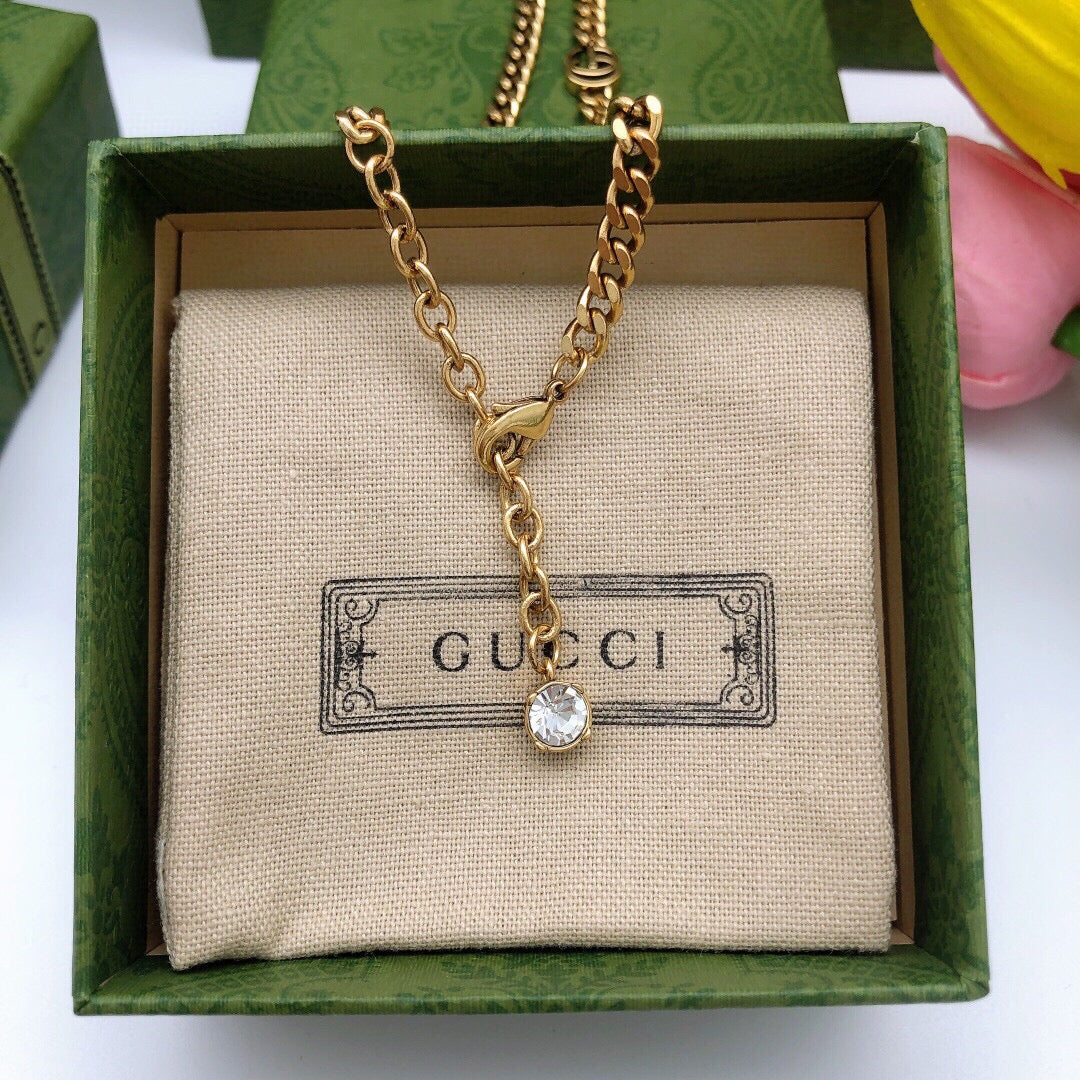 Geometric Emblem Pendant Necklace in Polished Metal-Tone – Crystal Detail side detail