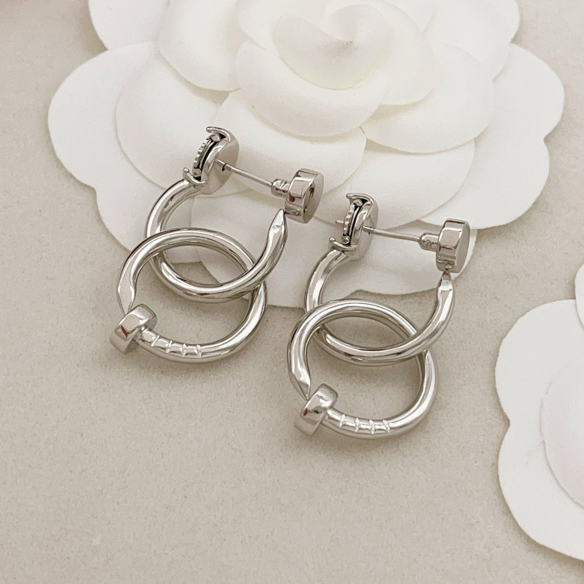 Nail Motif Earrings in Silver-Tone side detail
