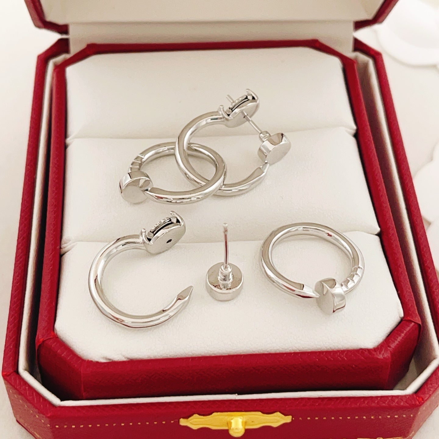 Nail Motif Earrings in Silver-Tone front view