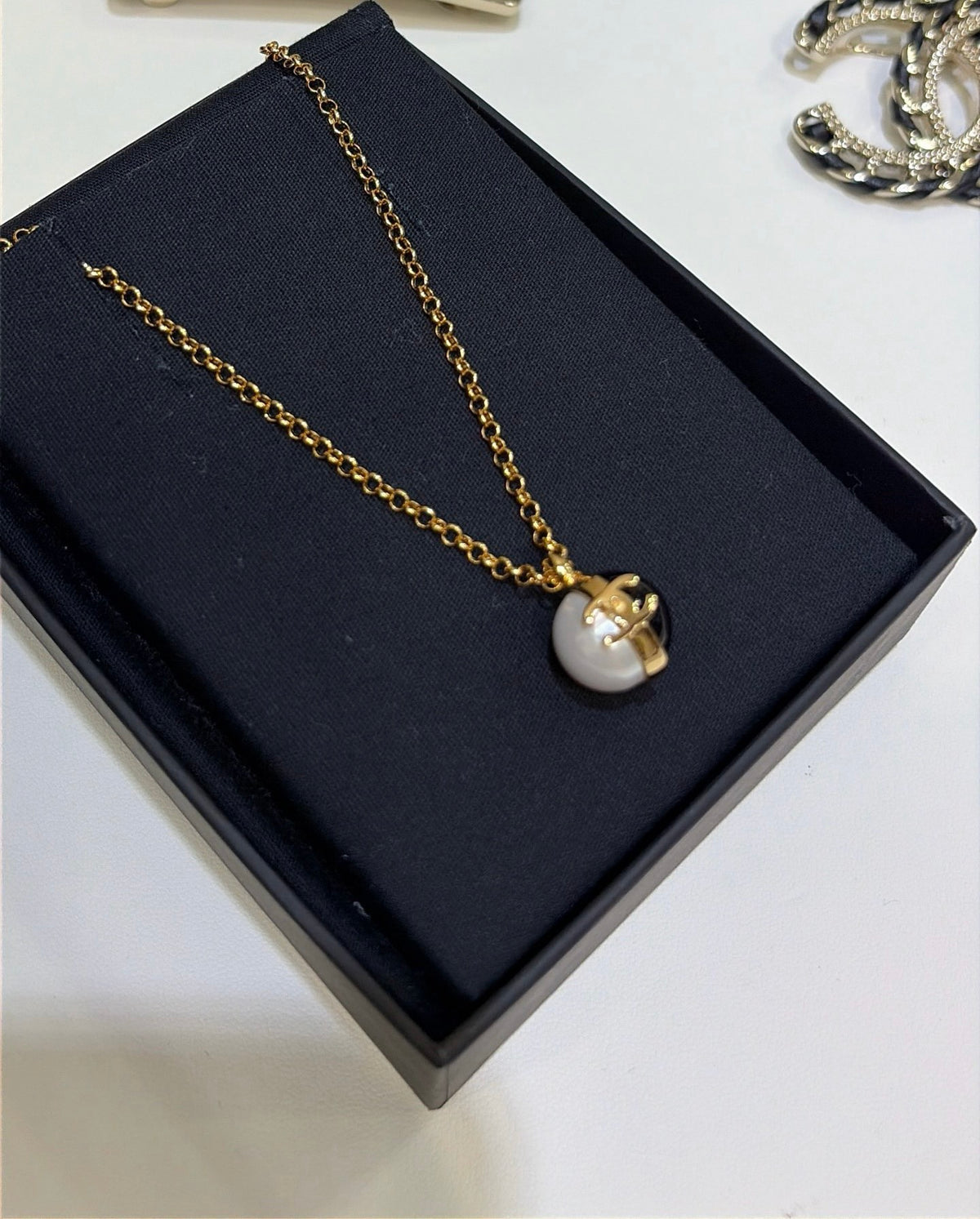 Double-C Emblem Pearl-Detail Pendant Necklace – Pearl Detail – Design 064 close-up detail