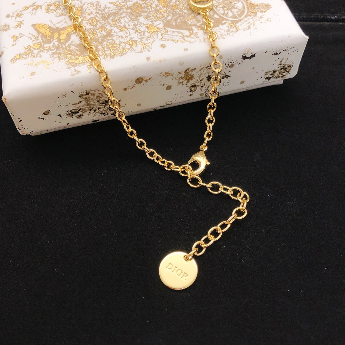 Bow & Butterfly Motif Pendant Necklace in Gold-Tone with Layered Detail – Design 002 detail view